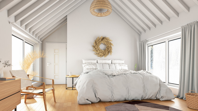 White wood beams in bedroom