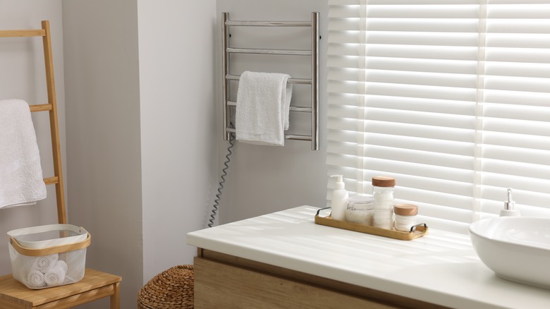 Bathroom with heated towel rack