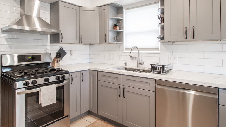 white countertops in small kitchen