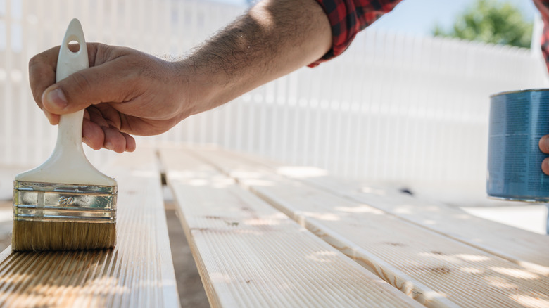 applying chemical to wood