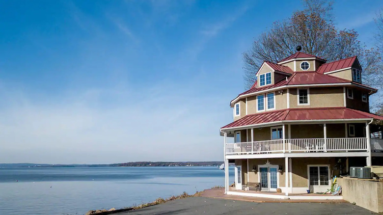 polygonal lighthouse on bay