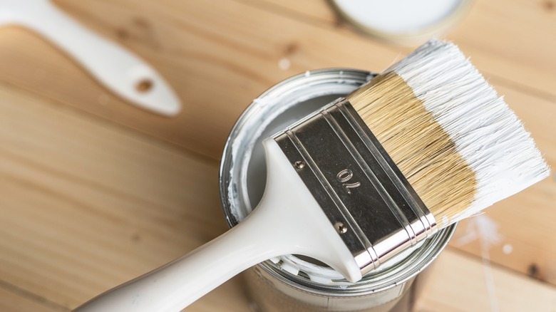 White paint on brush