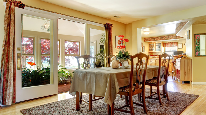 Dining room facing patio greenhouse