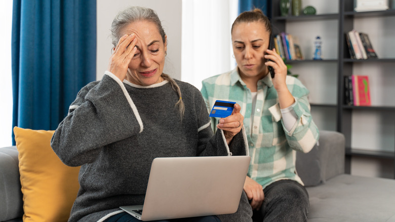 woman upset at computer