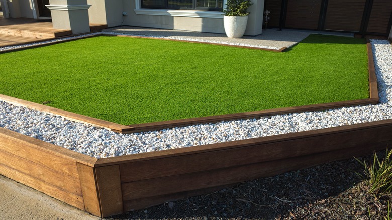 Artificial turf surrounded by stones