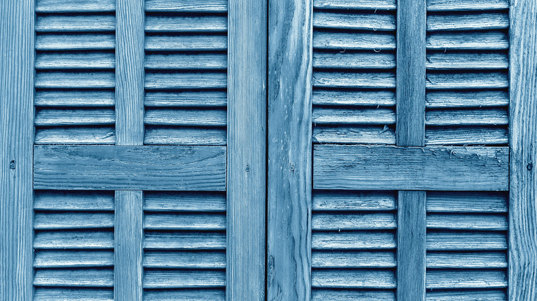 Blue painted wooden shutters