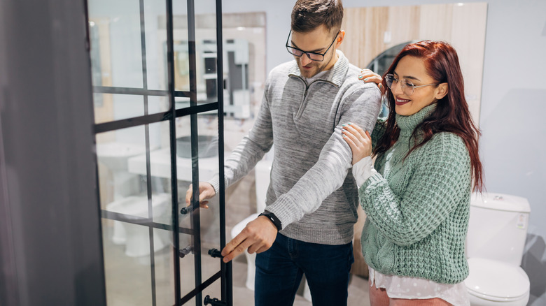 couple shopping for bathroom fixtures