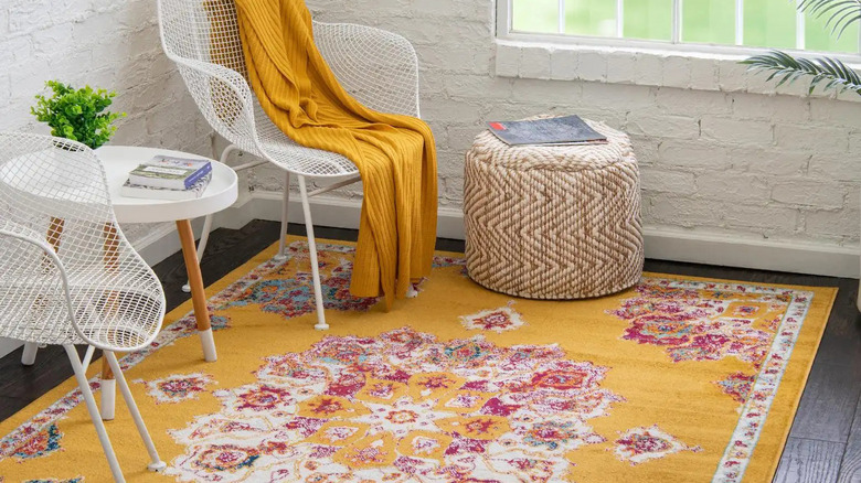 room with a yellow rug