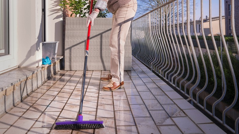 cleaning dirty tile floor