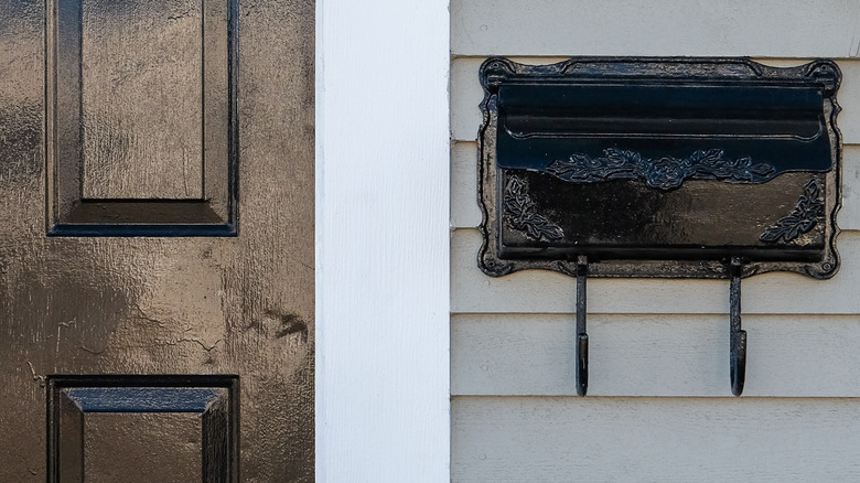 Black door with damage