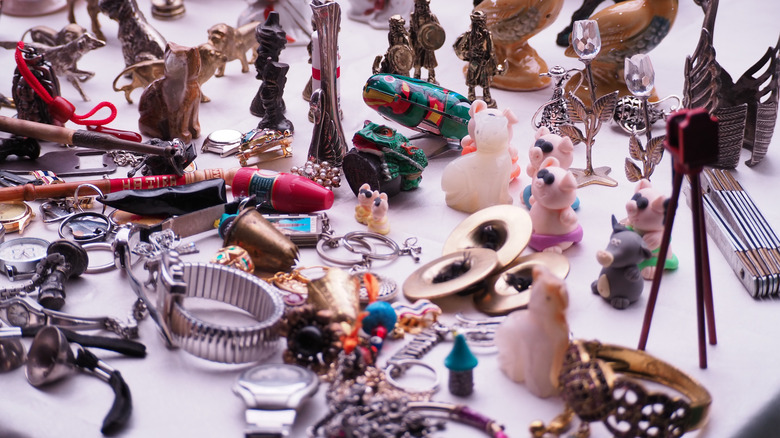 Various mementos and trinkets sit on a table.