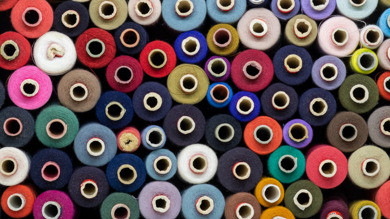 colored spools of thread