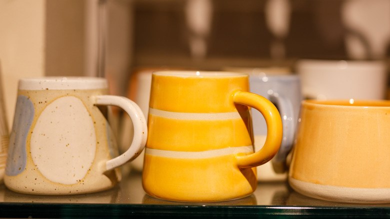 Mismatched coffee mugs together