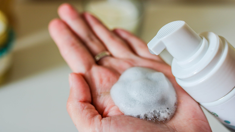 pumping foam soap into hand