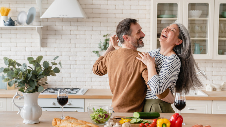 A couple dancing in kitchen