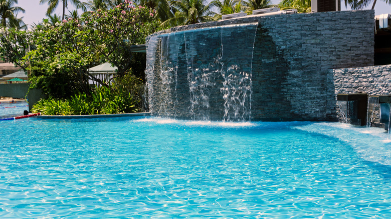 Pool with faux stone wall 