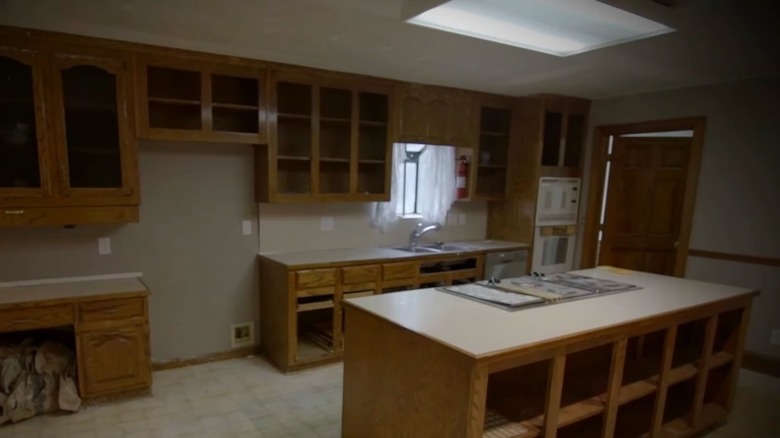 Kitchen with broken cabinets