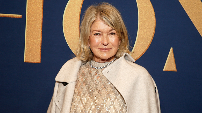 Martha Stewart is smiling at the camera.