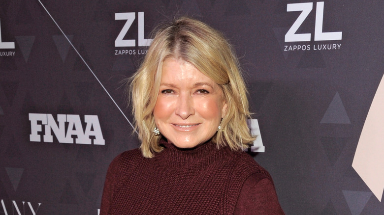 Martha Stewart wearing burgundy sweater