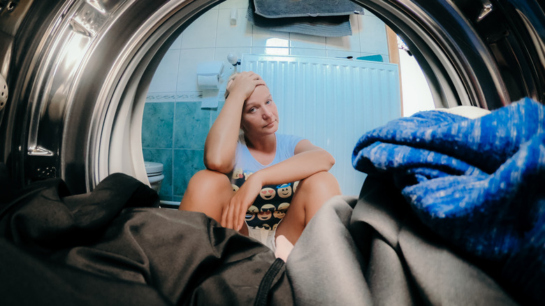 woman waiting for laundry 