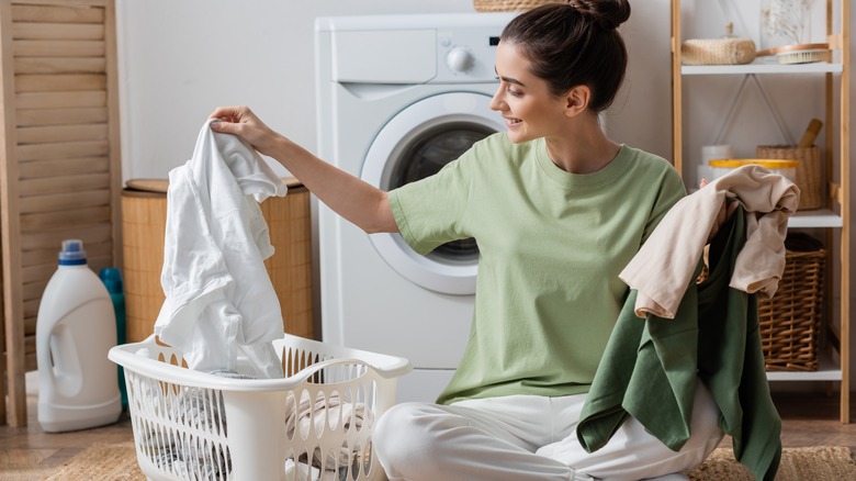 woman sorting laundry