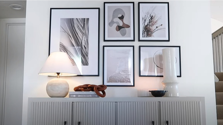 Entryway sideboard with lamp and art