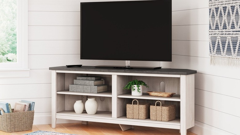 Corner TV stand with shelving