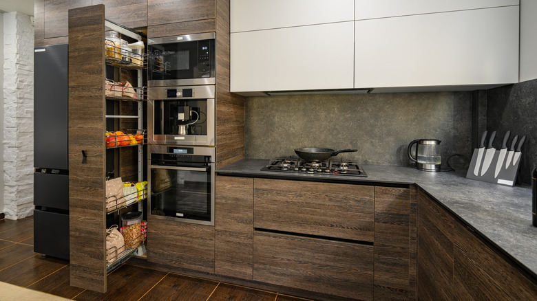 Small kitchen hidden sliding pantry