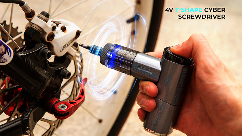 MECHTRON 4V t-shape cyber screwdriver being used on a bike tire