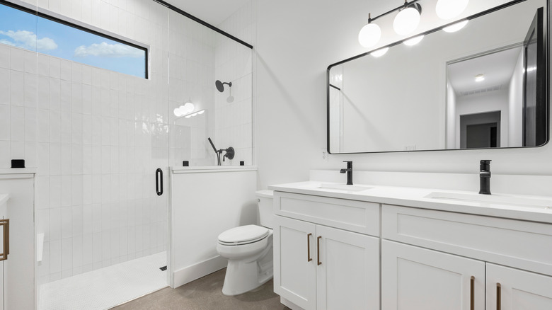 modern bathroom with window in shower