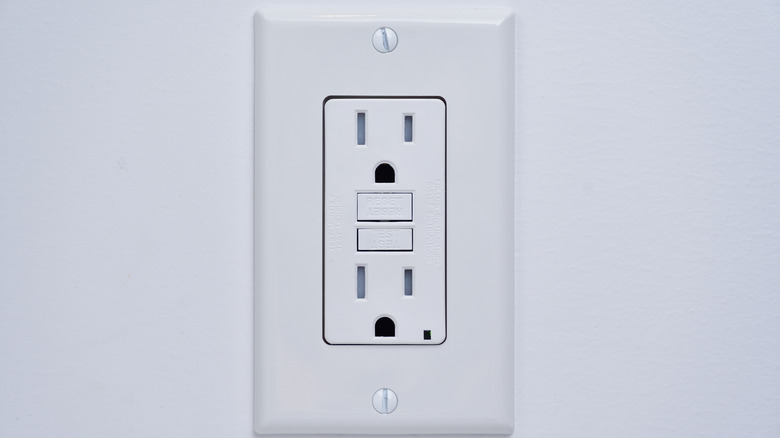 Tamper resistant GFCI Ground Fault Circuit Interrupter power outlet