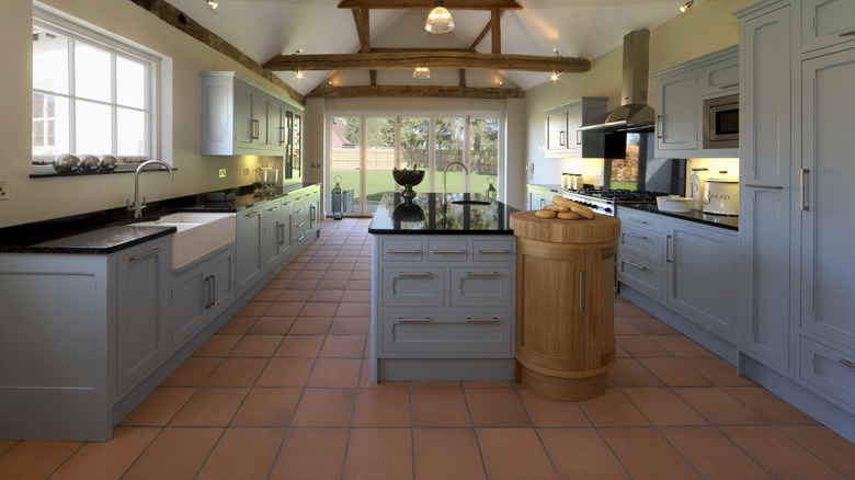 black and white checkered floor tiles tiled in kitchen