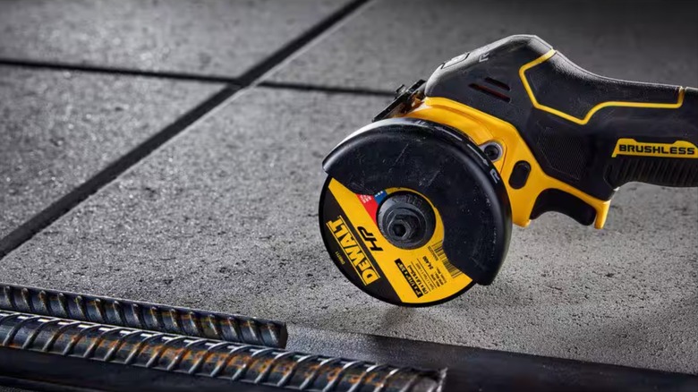 DeWalt cut off tool sitting on concrete surface