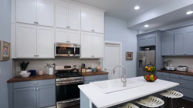 kitchen with blue cabinetry