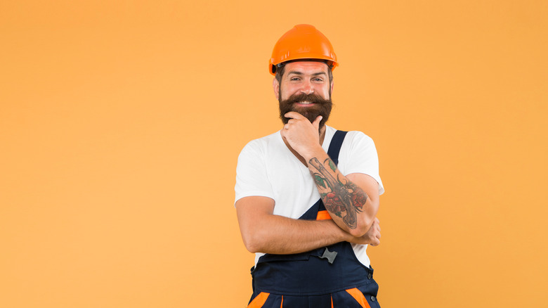 Builder smiling at the camera