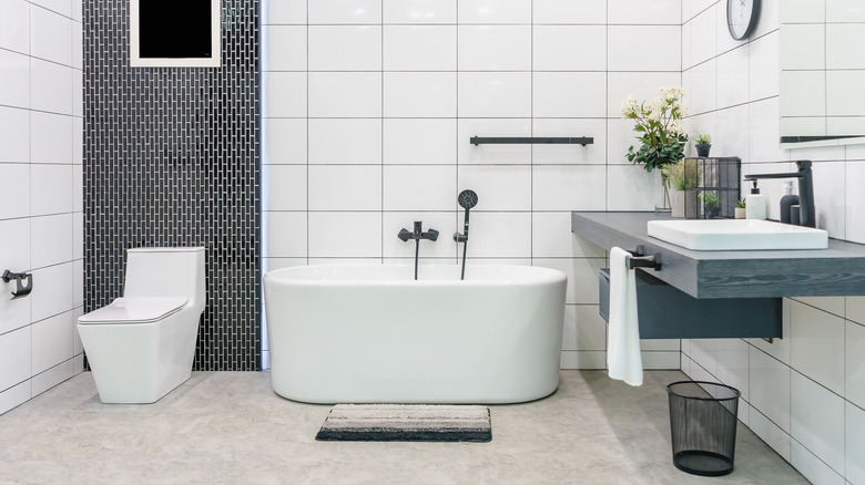 modern oval bathroom white tile