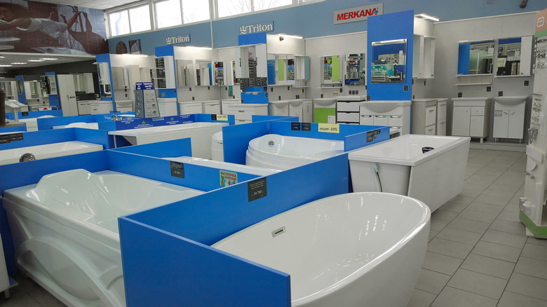 several bathtubs in store