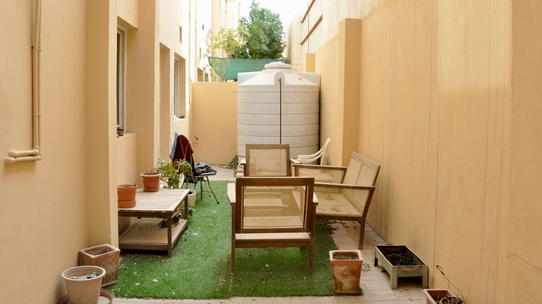 tiny yard with outdoor chairs