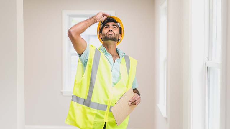 Man in safety vest and hat