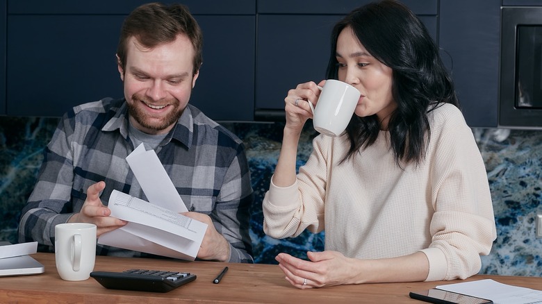 couple looking at papers