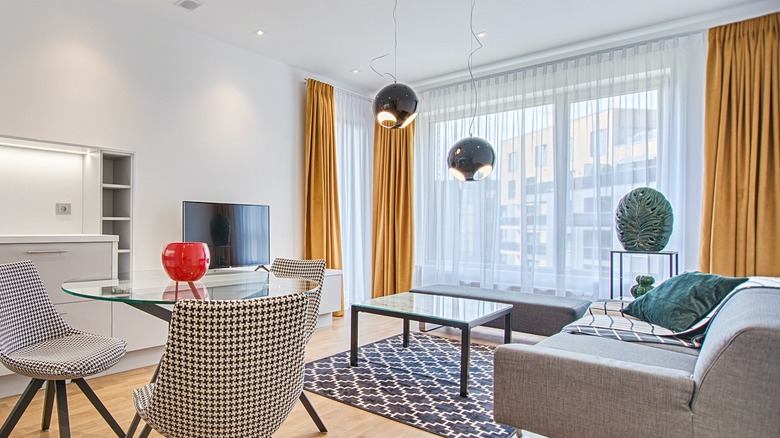 bright apartment with yellow curtains