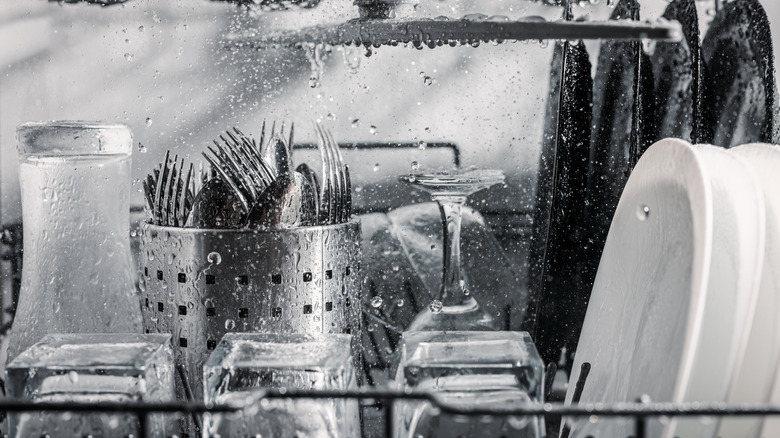 water running inside dishwasher