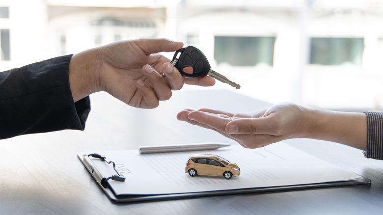 handing over the car keys