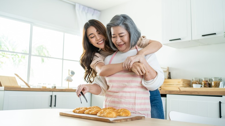 mother and daughter in kitchen