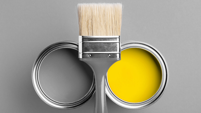 yellow and gray paint cans