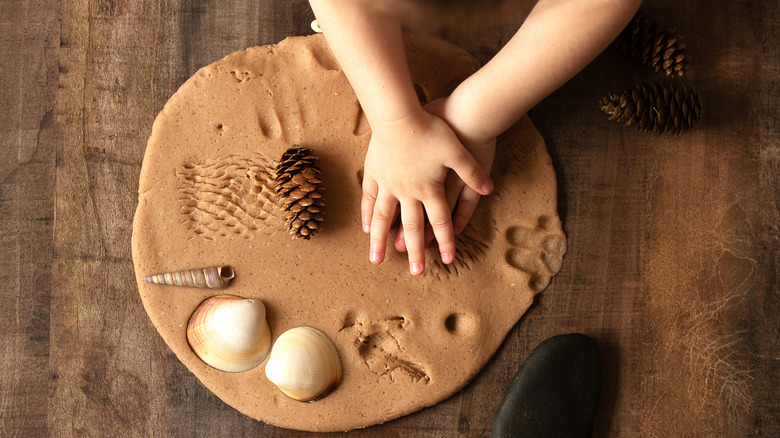 cutting out shapes in salt dough