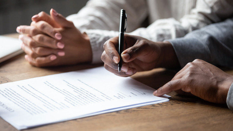 couple signing a contract