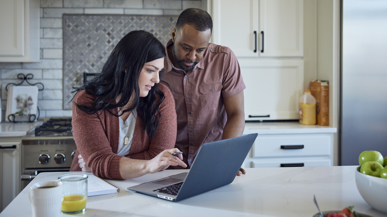 Couple working on the computer together