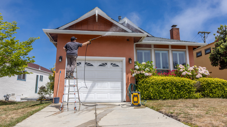 Pressure washing on a ladder is unsafe