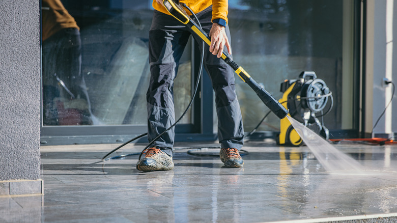 Pressure washing a terrace